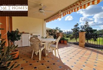 FULLY FURNISHED FRONTLINE GOLF APARTMENT WITH LARGE TERRACE BEAUTIFUL VIEWS - POOL AND A GARAGE