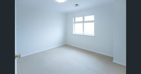 Spacious 3-Bedroom Home in a Convenient Brooklyn Park Location - Photo 4
