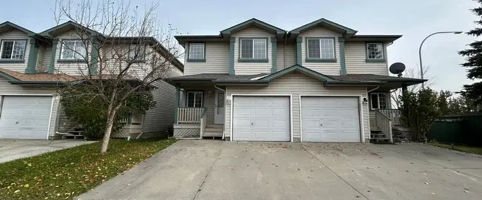 Renovated and Bright 2 Bedroom 2.5 Bathroom Townhouse with Garage! | 2004 Grantham Court Northwest, Edmonton - Photo 1