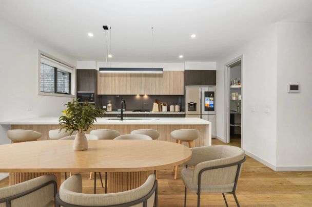 Stylish Townhouse Offering Effortless Modern Living - Photo 1