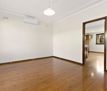 Spacious home with city skyline views and parking. - Photo 1
