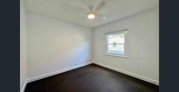 Freshly Updated Home with a Spacious Covered Deck - Photo 1