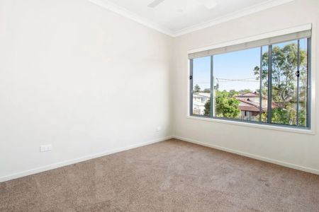 Stylish Three-Bedroom Townhome in Prime Location - Photo 2