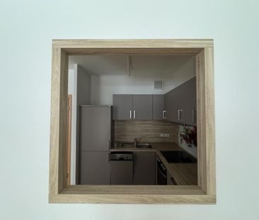 Gemütliche 2-Raum-Wohnung mit Einbauküche - Foto 5