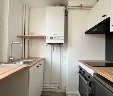 WILSON – T2 RDC SUR COUR – 34.07 M² - Photo 1