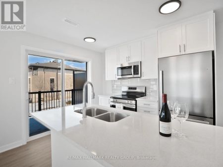 11 - 301 GLENROY GILBERT DRIVE - Photo 2