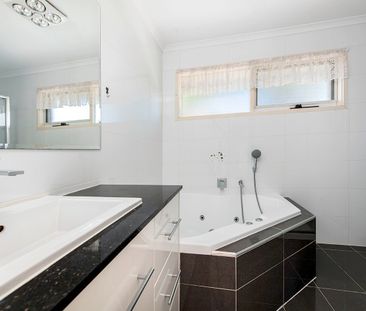 Spacious Four-Bedroom, North-Facing Family Home with Solar Savings - Photo 6