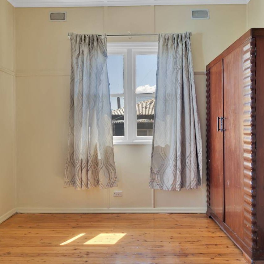 Classic Comfort in Centenary Heights - Photo 1