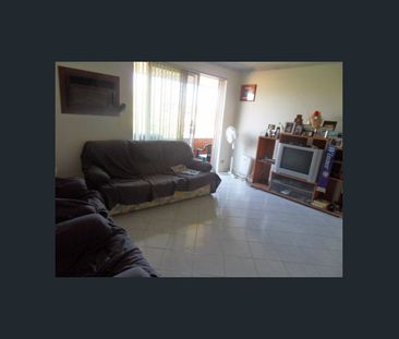 Top Floor Unit in a Great Location! - Photo 2