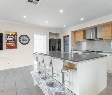 Exquisite Family Living in a Modern Luxury Home - Photo 6