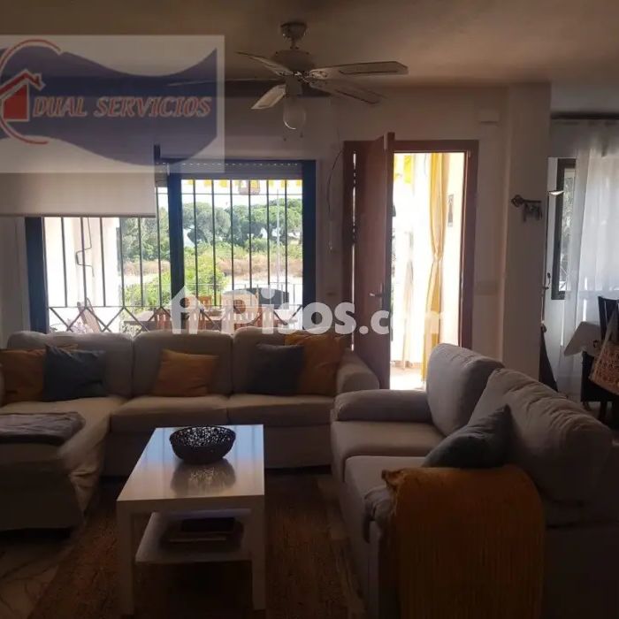 Casa adosada en alquiler en Nuevo Portil - Photo 1