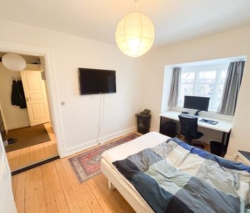 Hyggelig 2 værelses lejlighed med udsigt til østre anlæg - Photo 5