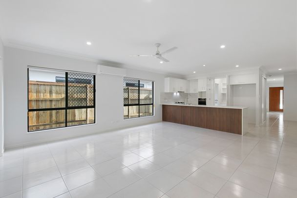 MAJESTIC MASTERPIECE WITH MEDIA ROOM – SOUGHT AFTER LOCATION IN SCHOOL CATCHMENT! - Photo 1