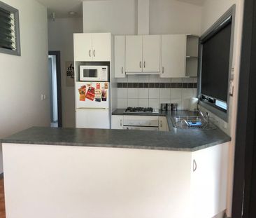 Conveniently Located Unit with Flexible Furnishing Options - Photo 2