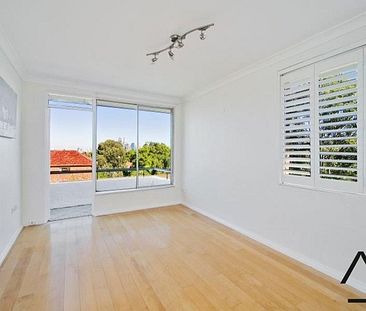 Top Floor Apartment in Sought After Location - Photo 1