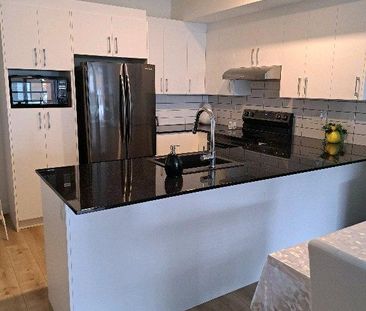 CONDO HAUTE GAMME 41/2 (CESSATION BAIL) - Photo 2