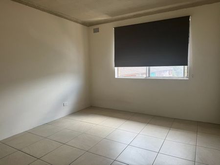 RENOVATED 2 BEDROOM UNIT - Photo 2