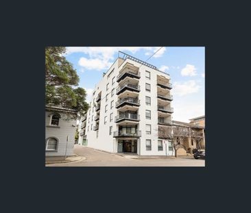 Bright & Modern Apartment with City Views + Parking - Photo 6