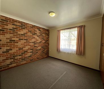 Comfortable Living with Garage and Outdoor Space - Photo 3