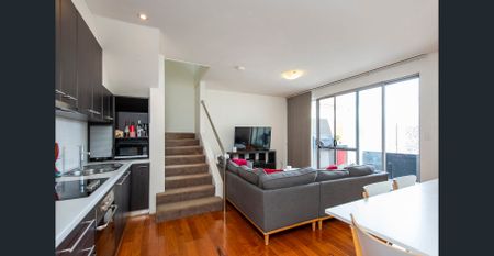 🌿 Low-Maintenance Living in a Prime Location! - Photo 2