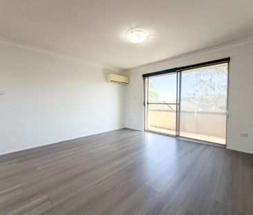 Renovated, Light-Filled & Low-Maintenance Living in the Heart of Pe... - Photo 1