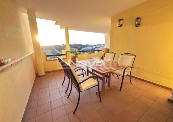 Noble luxury. Two bedroom apartment in a quiet urbanization overlooking the sea and golf cour