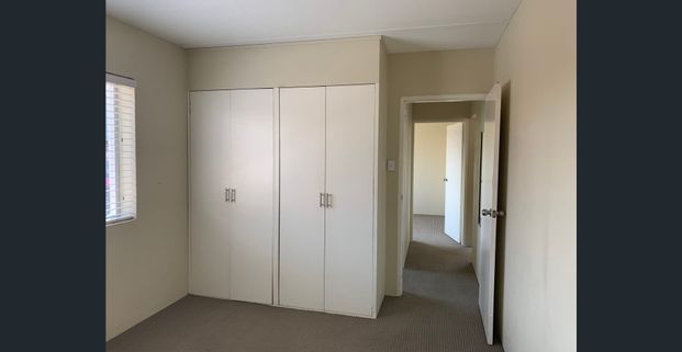 FIRST FLOOR APARTMENT IN CONVENIENT LOCATION - Photo 1