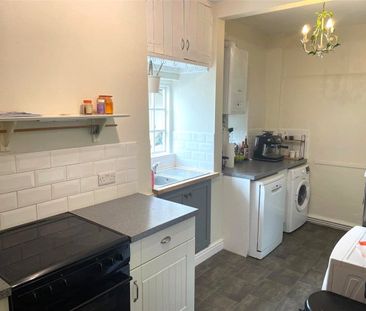 Available mid-April, we offer to you 21 Main Street, a delightful t... - Photo 5