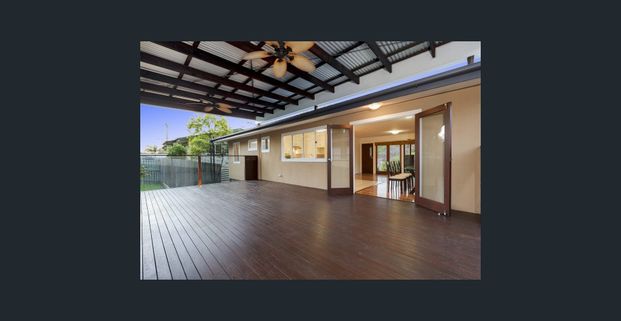 Family Living with Pool & Entertaining Deck in Stafford Heights - Photo 1