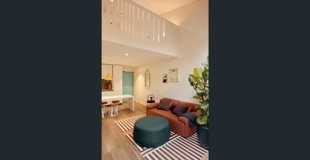 Sleek Furnished Apartment in Prime Location! - Photo 2