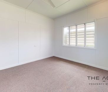 High-set family home in central location - Photo 2