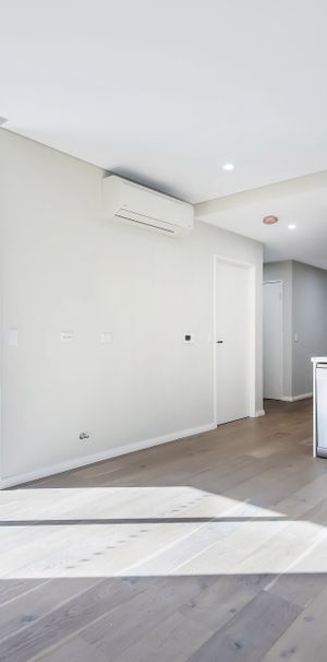 Modern two bedroom unit - 20% below market rent - Photo 1