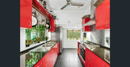 Quiet Charm with Massive Bedrooms and Storage Galore - Photo 5