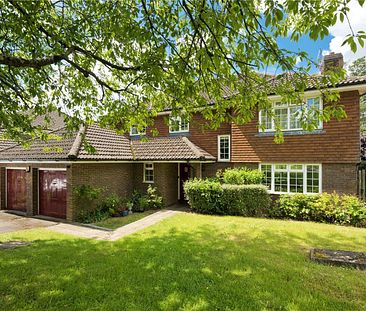 A detached family home set in a quiet no through road location within a short drive of Oxshott station. - Photo 2