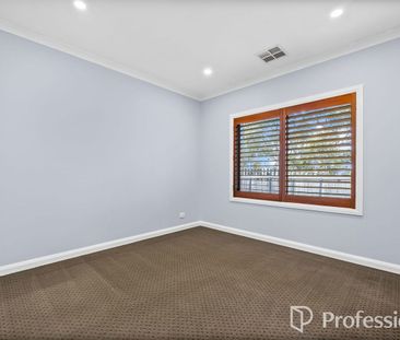 Beautiful Family Home with Multiple Living Zones & Modern Comforts! - Photo 5