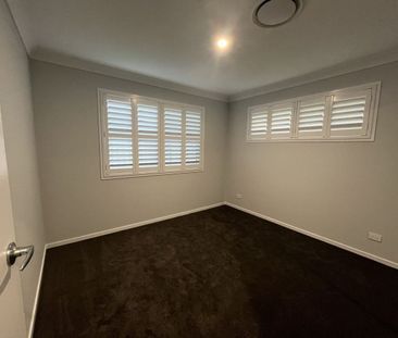 Stylish Modern Home with Ducted A/C & Water Included - Photo 3