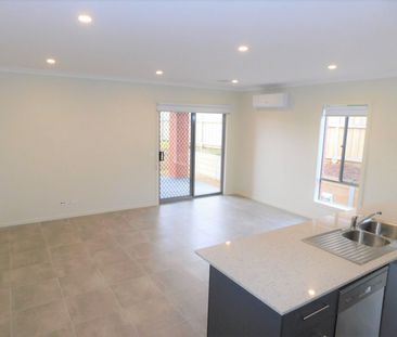 FOUR BEDROOM FAMILY HOME WITH LANDSCAPED GARDENS - Photo 1