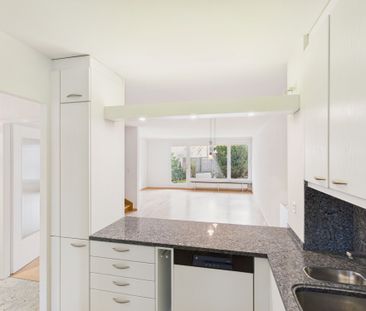 Charming and spacious corner row single-family house in a sought-af... - Photo 1