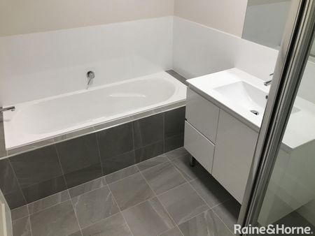 NEAR NEW 4 BEDROOM HOME - Photo 4