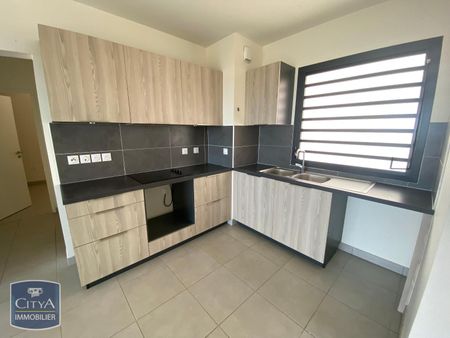 Location Appartement 4 pièces 84m² ST DENIS 97400 - Photo 4