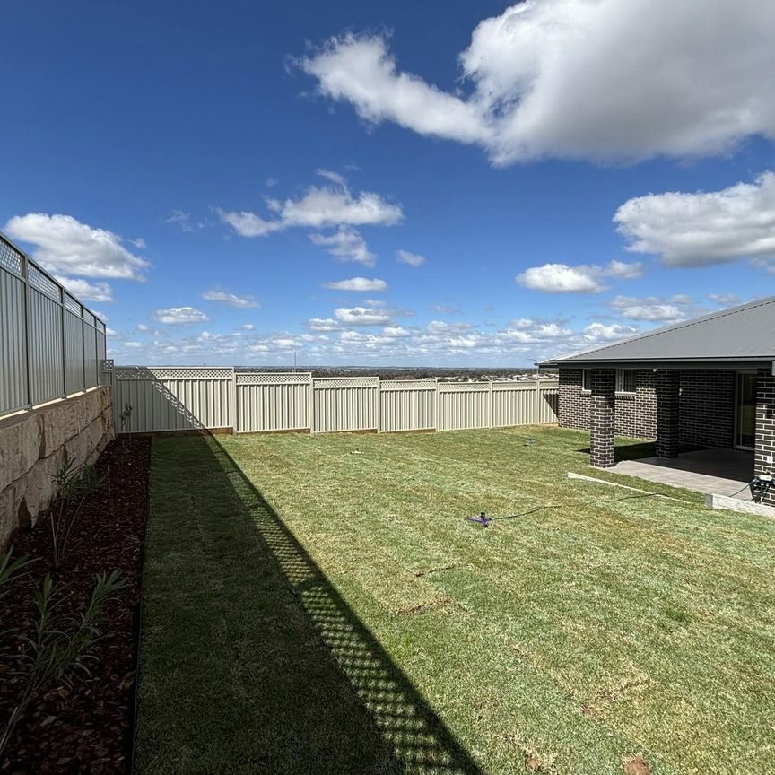 BRAND NEW FOUR BEDROOM FAMILY HOME - Photo 1