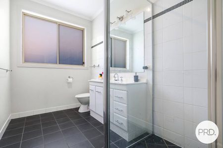 FULLY FURNISHED QUALITY FAMILY HOME WITH A POOL! - Photo 5