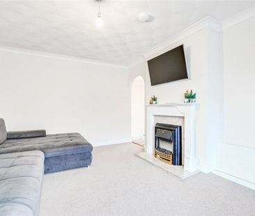 A 2 bedroom detached bungalow with a garage and driveway parking in... - Photo 3