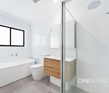 MODERN THREE-BEDROOM HOME WITH QUALITY INTERIORS - Photo 6