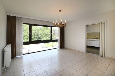 Gezellig appartement met 2 slpk., autostaanplaats, wandelafstand van het centrum - Photo 4