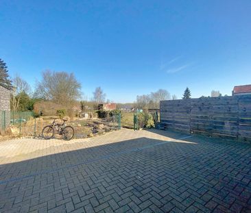 Vernieuwd gelijkvloers appartement met terras en tuin - Foto 2