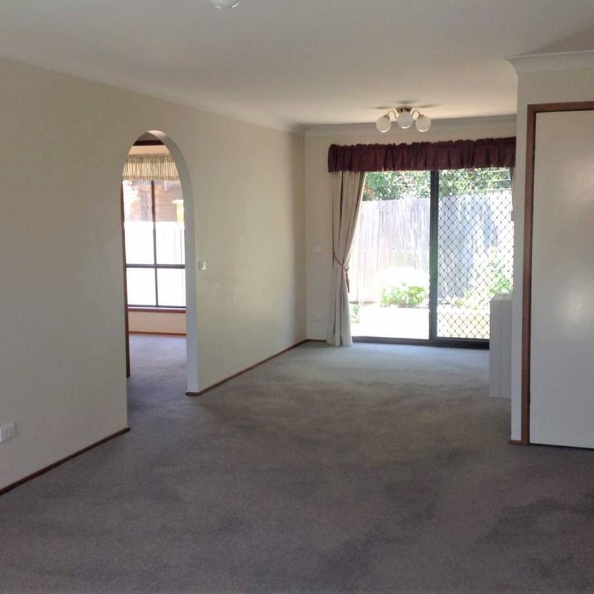 NEAT UNIT IN QUIET LOCATION - Photo 1