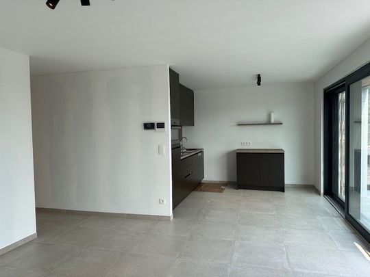 Dit prachtige nieuwbouwappartement met 1 slaapkamer. - Photo 1