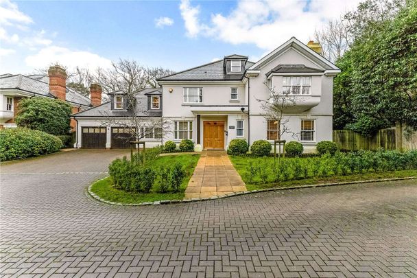 A well presented six bedroom detached family home situated in private gated close around 0.6 of a mile from Oxshott Station and 1.3 of a mile from Danes Hill School. - Photo 1