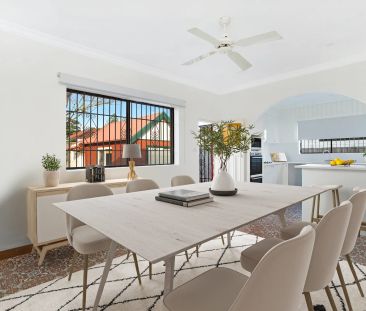 REJUVENATED AIR-CONDITIONED FAMILY HOME IN SOUGHT AFTER STREET - Photo 1